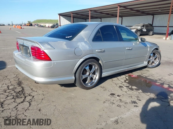 2002 Lincoln LS w/Base Pkg with VIN 1LNHM87A62Y691524, listed as a IAAI auction lot 41670369 with 166,567 mi miles. Bid and sale history available at carsss.com. Image 4.