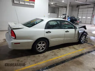 2002 Mitsubishi Diamante z VIN 6MMAP87P62T017071, wystawiony jako Copart lot #50581855 z przebiegiem 189 166 mil mil oraz Szkoda całkowita • Salvage title. Historia ofert i sprzedaży dostępna na DreamBid. Obrazek 3.