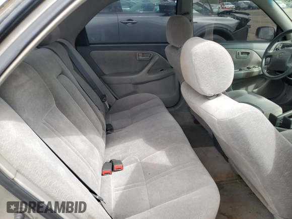 1999 Toyota Camry LE с VIN 4T1BG22K6XU404532, выставлен на аукционе Copart как лот 57449655 с пробегом 173 587 миль миль и Списание • Salvage title. История ставок и продаж доступна на DreamBid. Изображение 10.