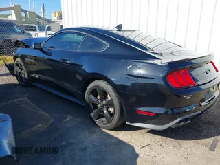 2023 Ford Mustang GT with VIN 1FA6P8CF6P5302934, listed as a IAAI auction lot 41943040 with 23,158 mi miles and . Bid and sale history available at carsss.com. Image 3.