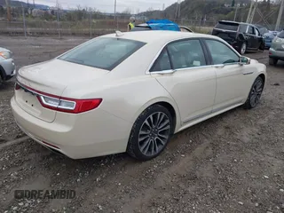 2018 Lincoln Continental Reserve with VIN 1LN6L9NP1J5609285, listed as a IAAI auction lot 42011710 with 57,158 mi miles and . Bid and sale history available at DreamBid. Image 4.