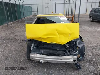 2001 Saturn SC z VIN 1G8ZY12721Z325482, wystawiony jako IAAI lot #42263797 z przebiegiem Nie podano mil oraz . Historia ofert i sprzedaży dostępna na DreamBid. Obrazek 6.