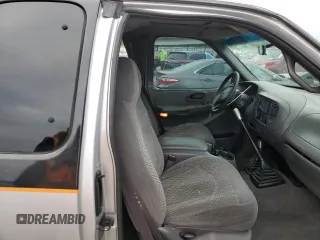 1999 Ford F-150 z VIN 2FTRX08WXXCA60270, wystawiony jako Copart lot #51913935 z przebiegiem Nie podano mil oraz Szkoda całkowita • Salvage title. Historia ofert i sprzedaży dostępna na DreamBid. Obrazek 7.