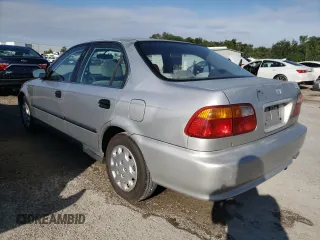 1999 Honda Civic LX with VIN 2HGEJ6678XH560446, listed as a Copart auction lot 56669794 with 197,100 mi miles and Non Repairable. Bid and sale history available at carsss.com. Image 2.