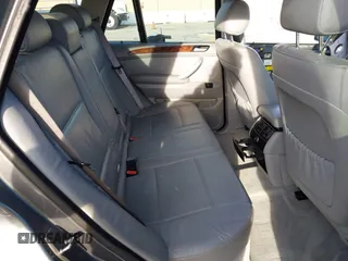 2003 BMW X5 3.0i with VIN 5UXFA53573LV83812, listed as a IAAI auction lot 41590046 with 166,841 mi miles. Bid and sale history available at carsss.com. Image 8.