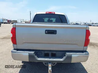 2014 Toyota Tundra SR5 z VIN 5TFEM5F15EX068560, wystawiony jako IAAI lot #42265351 z przebiegiem 163 294 mil mil oraz . Historia ofert i sprzedaży dostępna na DreamBid. Obrazek 16.