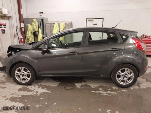 2015 Ford Fiesta SE with VIN 3FADP4EJ8FM138306, listed as a IAAI auction lot 41227124 with 106,741 mi miles. Bid and sale history available at carsss.com. Image 14.