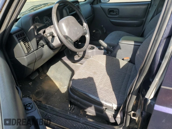 1999 Jeep Cherokee SE with VIN 1J4FF28S0XL541871, listed as a Copart auction lot 59250264 with Not provided miles and Salvage title. Bid and sale history available at DreamBid. Image 8.