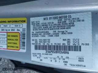 2015 Ford Fusion Energi Titanium with VIN 3FA6P0SU8FR264846, listed as a IAAI auction lot 41552443 with 160,142 mi miles. Bid and sale history available at carsss.com. Image 9.