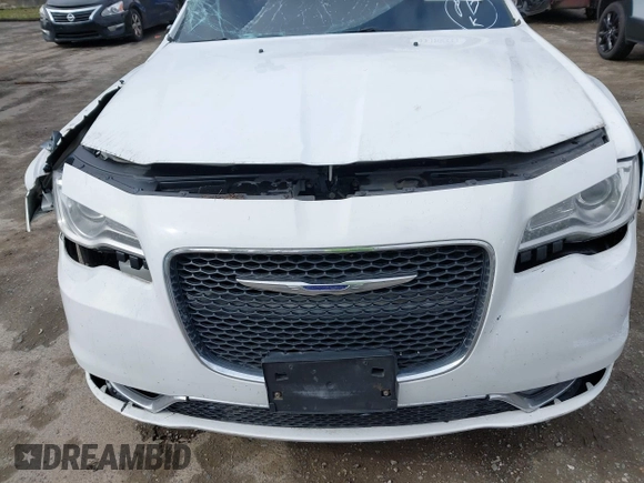 2016 Chrysler 300 Anniversary Edition with VIN 2C3CCARG1GH270827, listed as a IAAI auction lot 41765997 with 122,288 mi miles and . Bid and sale history available at DreamBid. Image 6.