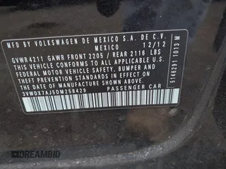 2013 Volkswagen Jetta SE z VIN 3VWDX7AJ5DM258429, wystawiony jako IAAI lot #42372776 z przebiegiem 211 579 mil mil oraz . Historia ofert i sprzedaży dostępna na DreamBid. Obrazek 9.