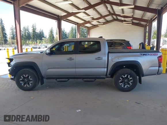 2018 Toyota Tacoma SR with VIN 3TMCZ5ANXJM146284, listed as a IAAI auction lot 42041525 with 103,143 mi miles and . Bid and sale history available at DreamBid. Image 15.