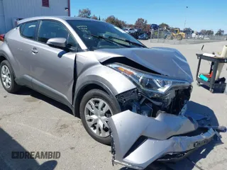 2019 Toyota C-HR XLE with VIN JTNKHMBX0K1050506, listed as a IAAI auction lot 41825365 with 88,184 mi miles. Bid and sale history available at carsss.com. Image 1.