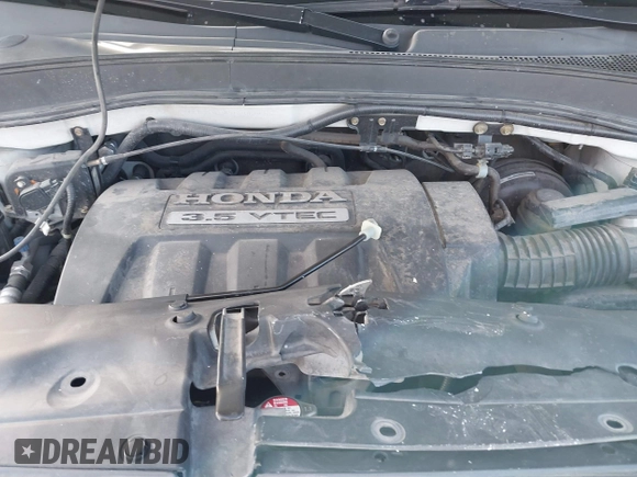 2005 Honda Pilot EX with VIN 5FNYF18475B060655, listed as a IAAI auction lot 41381619 with 142,680 mi miles and . Bid and sale history available at DreamBid. Image 10.