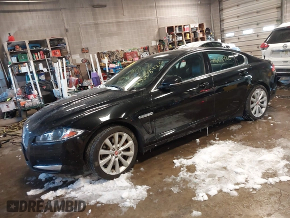 2014 Jaguar XF V6 SC with VIN SAJWJ0EF2E8U13746, listed as a IAAI auction lot 41608420 with 141,476 mi miles. Bid and sale history available at carsss.com. Image 2.