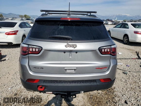 2019 Jeep Compass Trailhawk with VIN 3C4NJDDB9KT668858, listed as a Copart auction lot 58603645 with 74,226 mi miles and Salvage title. Bid and sale history available at DreamBid. Image 6.