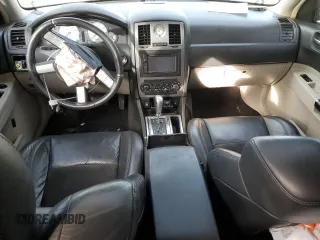 2006 Chrysler 300 C SRT8 with VIN 2C3LA73WX6H106631, listed as a Copart auction lot 50715715 with 104,990 mi miles and Clean Title. Bid and sale history available at carsss.com. Image 8.