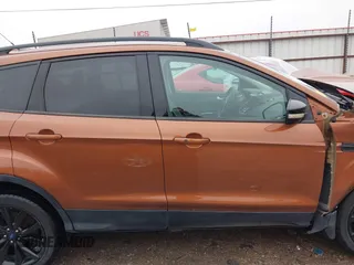 2017 Ford Escape Titanium with VIN 1FMCU9J99HUB75687, listed as a IAAI auction lot 41180789 with 108,967 mi miles. Bid and sale history available at carsss.com. Image 14.