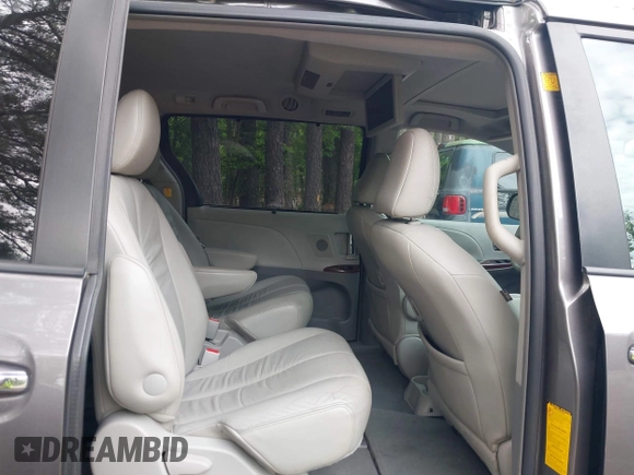 2011 Toyota Sienna XLE AAS with VIN 5TDYK3DC8BS016319, listed as a IAAI auction lot 42186294 with 293,401 mi miles and . Bid and sale history available at DreamBid. Image 8.