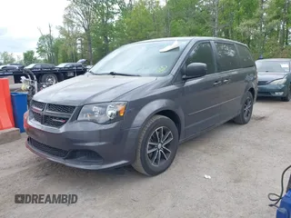 2015 Dodge Grand Caravan American Value with VIN 2C4RDGBG2FR542844, listed as a IAAI auction lot 42109983 with 129,718 mi miles and . Bid and sale history available at DreamBid. Image 17.