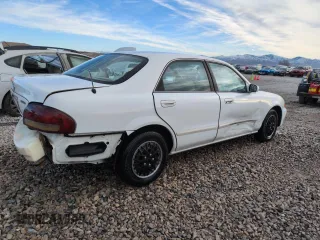 1999 Mazda 626 ES with VIN 1YVGF22C9X5887587, listed as a Copart auction lot 46346305 with 92,715 mi miles and Salvage Title. Bid and sale history available at carsss.com. Image 3.