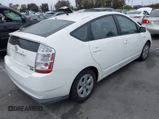 2007 Toyota Prius z VIN JTDKB20UX77550163, wystawiony jako IAAI lot #42379609 z przebiegiem 136 507 mil mil oraz . Historia ofert i sprzedaży dostępna na DreamBid. Obrazek 4.