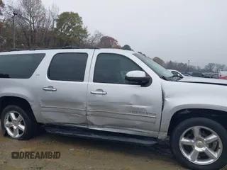 2014 Chevrolet Suburban LTZ with VIN 1GNSCKE05ER173446, listed as a IAAI auction lot 41047096 with 189,049 mi miles and . Bid and sale history available at DreamBid. Image 6.