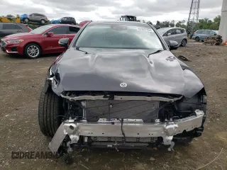 2021 Mercedes-Benz E-Class E 450 with VIN W1KZF5KB9MA931765, listed as a Copart auction lot 69393194 with 24,991 mi miles and Salvage Title. Bid and sale history available at carsss.com. Image 5.