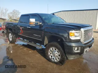 2015 GMC Sierra 2500HD available WiFi Denali with VIN 1GT120E89FF667555, listed as a Copart auction lot 43565795 with 196,759 mi miles and Salvage Title. Bid and sale history available at carsss.com. Image 4.