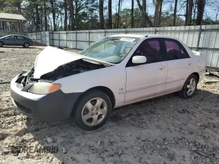 2002 Mazda Protege DX with VIN JM1BJ225321588287, listed as a Copart auction lot 49282455 with 248,379 mi miles and Salvage Title. Bid and sale history available at DreamBid. Image 1.