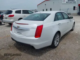 2019 Cadillac CTS RWD with VIN 1G6AP5SXXK0109823, listed as a IAAI auction lot 42401514 with 64,635 mi miles and . Bid and sale history available at DreamBid. Image 4.