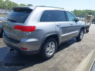 2017 Jeep Grand Cherokee Altitude with VIN 1C4RJEAG6HC647333, listed as a IAAI auction lot 42071820 with 129,740 mi miles and . Bid and sale history available at DreamBid. Image 4.