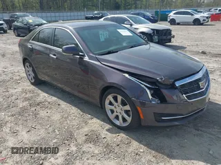 2015 Cadillac ATS Sedan Luxury RWD with VIN 1G6AB5RA6F0107167, listed as a IAAI auction lot 41935673 with 136,440 mi miles. Bid and sale history available at carsss.com. Image 1.