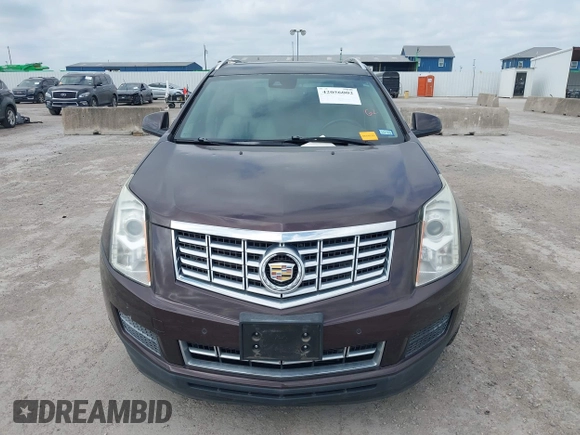 2015 Cadillac SRX Luxury Collection z VIN 3GYFNBE35FS597538, wystawiony jako IAAI lot #42056002 z przebiegiem 49 483 mil mil oraz . Historia ofert i sprzedaży dostępna na DreamBid. Obrazek 12.