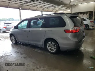 2016 Toyota Sienna XLE with VIN 5TDYK3DCXGS738530, listed as a Copart auction lot 61944505 with 254,176 mi miles and Salvage title. Bid and sale history available at DreamBid. Image 2.