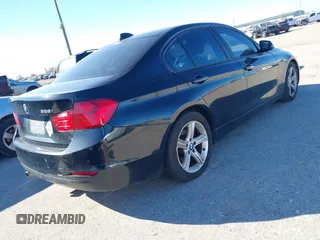 2015 BMW 3 Series 328i with VIN WBA3A5C55FF608159, listed as a IAAI auction lot 41255978 with 199,024 mi miles. Bid and sale history available at carsss.com. Image 4.