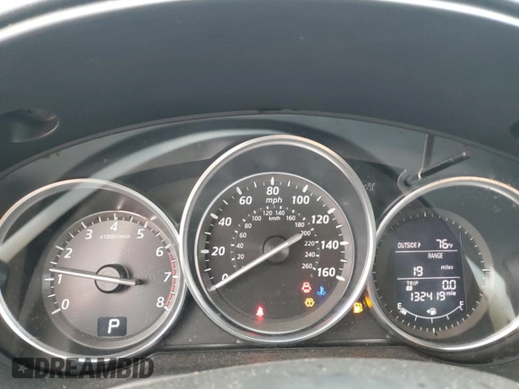 2015 Mazda CX-5 Touring with VIN JM3KE4CYXF0446370, listed as a Copart auction lot 52392575 with 132,419 mi miles and Salvage Title. Bid and sale history available at DreamBid. Image 9.