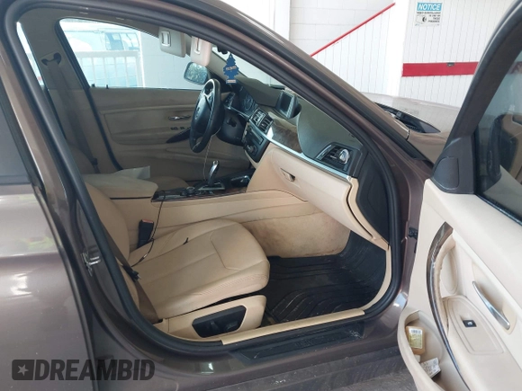 2013 BMW 3 Series 320i with VIN WBA3B1C54DK129838, listed as a IAAI auction lot 42752788 with 95,262 mi miles and . Bid and sale history available at DreamBid. Image 5.