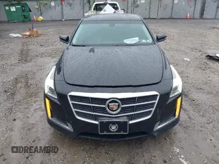 2014 Cadillac CTS AWD z VIN 1G6AW5SX4E0129136, wystawiony jako IAAI lot #42364098 z przebiegiem 137 080 mil mil oraz . Historia ofert i sprzedaży dostępna na DreamBid. Obrazek 12.