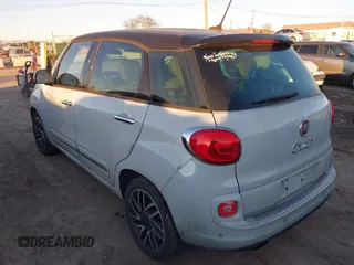 2015 FIAT 500L Lounge with VIN ZFBCFACH8FZ031314, listed as a IAAI auction lot 41392026 with 184,145 mi miles. Bid and sale history available at carsss.com. Image 3.