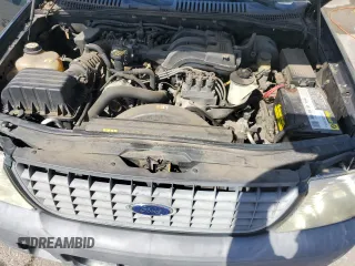 2004 Ford Explorer XLS with VIN 1FMZU62K64ZA56020, listed as a Copart auction lot 61139815 with 158,619 mi miles and Salvage title. Bid and sale history available at DreamBid. Image 12.
