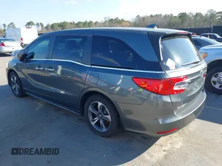 2020 Honda Odyssey Touring z VIN 5FNRL6H8XLB035047, wystawiony jako IAAI lot #41794343 z przebiegiem 57 537 mil mil oraz . Historia ofert i sprzedaży dostępna na DreamBid. Obrazek 3.