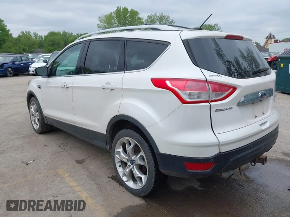 2016 Ford Escape Titanium with VIN 1FMCU9J96GUB97564, listed as a IAAI auction lot 42137663 with 269,009 mi miles. Bid and sale history available at carsss.com. Image 3.