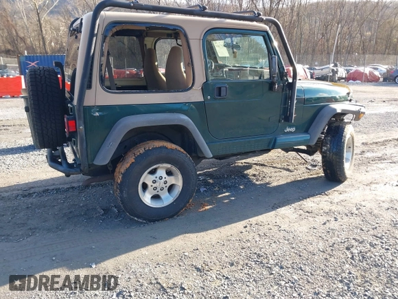 2000 Jeep Wrangler Sahara with VIN 1J4FA59S0YP724521, listed as a IAAI auction lot 41574689 with 167,584 mi miles. Bid and sale history available at carsss.com. Image 4.