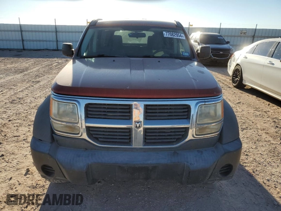 2007 Dodge Nitro SXT with VIN 1D8GU28K87W728744, listed as a Copart auction lot 77082954 with 245,632 mi miles and Salvage title. Bid and sale history available at DreamBid. Image 5.