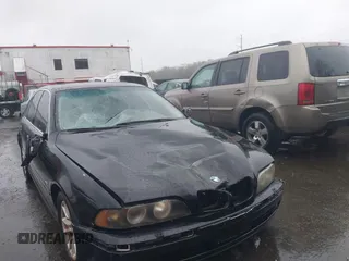 2002 BMW 5 Series 525iA with VIN WBADT43432GY95893, listed as a IAAI auction lot 42002537 with 140,026 mi miles. Bid and sale history available at carsss.com. Image 6.