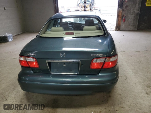 2000 Mazda Millenia z VIN JM1TA2212Y1610919, wystawiony jako Copart lot #80375014 z przebiegiem 127 938 mil mil oraz Szkoda całkowita • Salvage title. Historia ofert i sprzedaży dostępna na DreamBid. Obrazek 6.