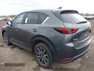 2017 Mazda CX-5 Grand Touring with VIN JM3KFBDL3H0143194, listed as a IAAI auction lot 42049258 with 74,159 mi miles. Bid and sale history available at carsss.com. Image 3.