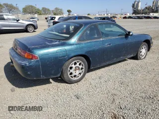 1995 Nissan 240SX z VIN JN1AS44D1SW014527, wystawiony jako Copart lot #54392065 z przebiegiem 197 136 mil mil oraz Tytuł czysty. Historia ofert i sprzedaży dostępna na DreamBid. Obrazek 3.