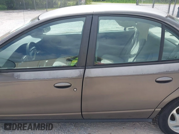 2000 Saturn SL z VIN 1G8ZK527XYZ121984, wystawiony jako IAAI lot #42099839 z przebiegiem 174 210 mil mil oraz . Historia ofert i sprzedaży dostępna na DreamBid. Obrazek 14.